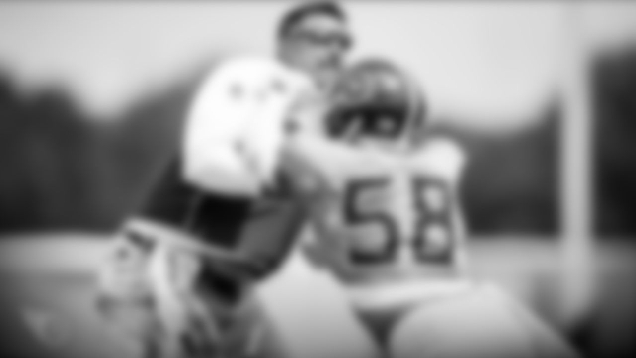 NASHVILLE, TN - AUGUST 31, 2020 - Head coach Mike Vrabel of the Tennessee Titans and Outside linebacker Harold Landry III #58 of the Tennessee Titans during practice at Saint Thomas Sports Park in Nashville, TN. Photo By Donald Page/Tennessee Titans