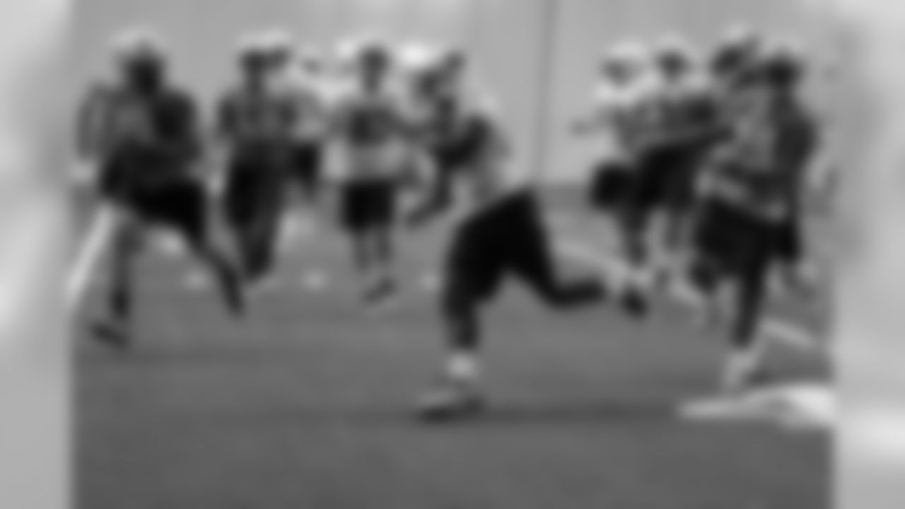Titans players practice inside during Tuesday's organized training activity (OTA) at Baptist Sports Park in Nashville, Tenn.