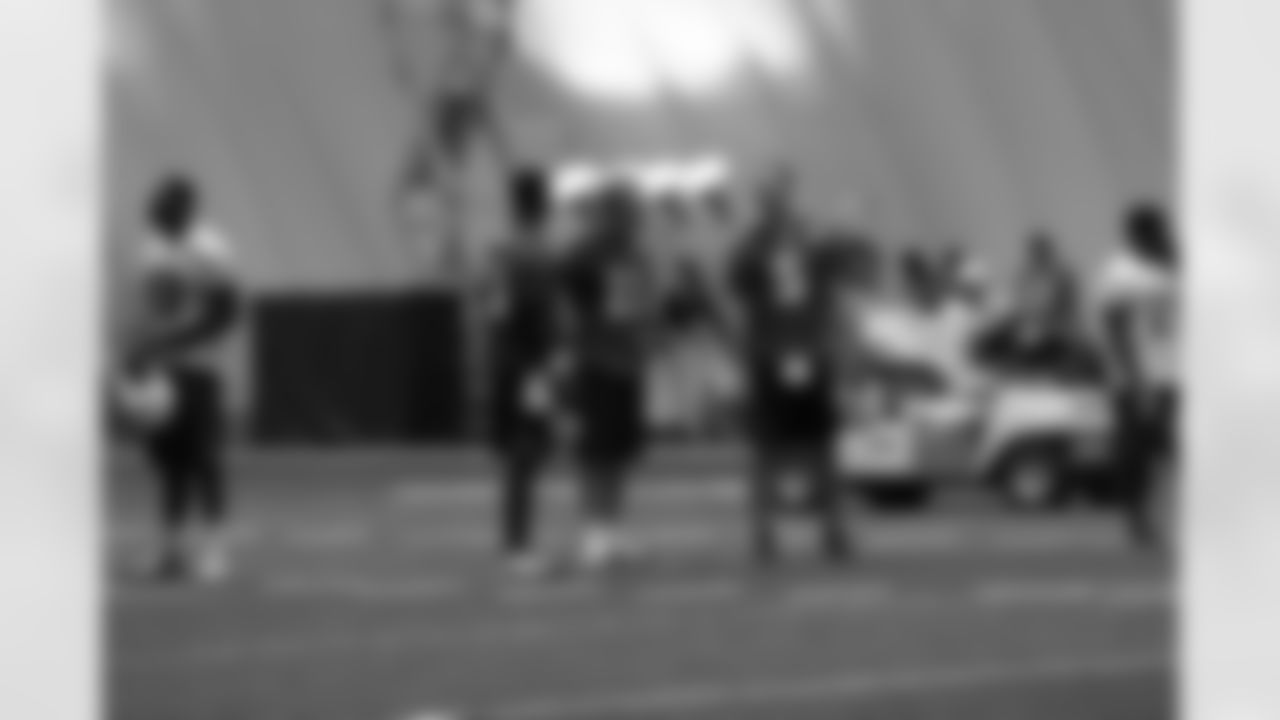 Titans players practice inside during Tuesday's organized training activity (OTA) at Baptist Sports Park in Nashville, Tenn.
