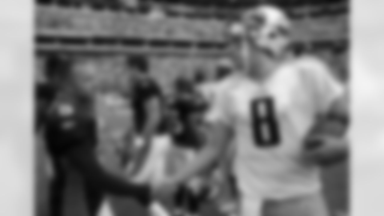 Tennessee Titans quarterback Matt Hasselbeck (8) is congratulated by Denver Broncos kicker Matt Prater (5) after the Titans won 17-14 in an NFL football game on Sunday, Sept. 25, 2011, in Nashville, Tenn. (AP Photo/Frederick Breedon)