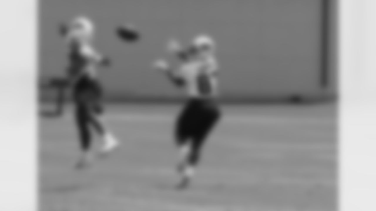 Titans players practice outside during Thursday's organized training activity (OTA) at Baptist Sports Park in Nashville, Tenn.