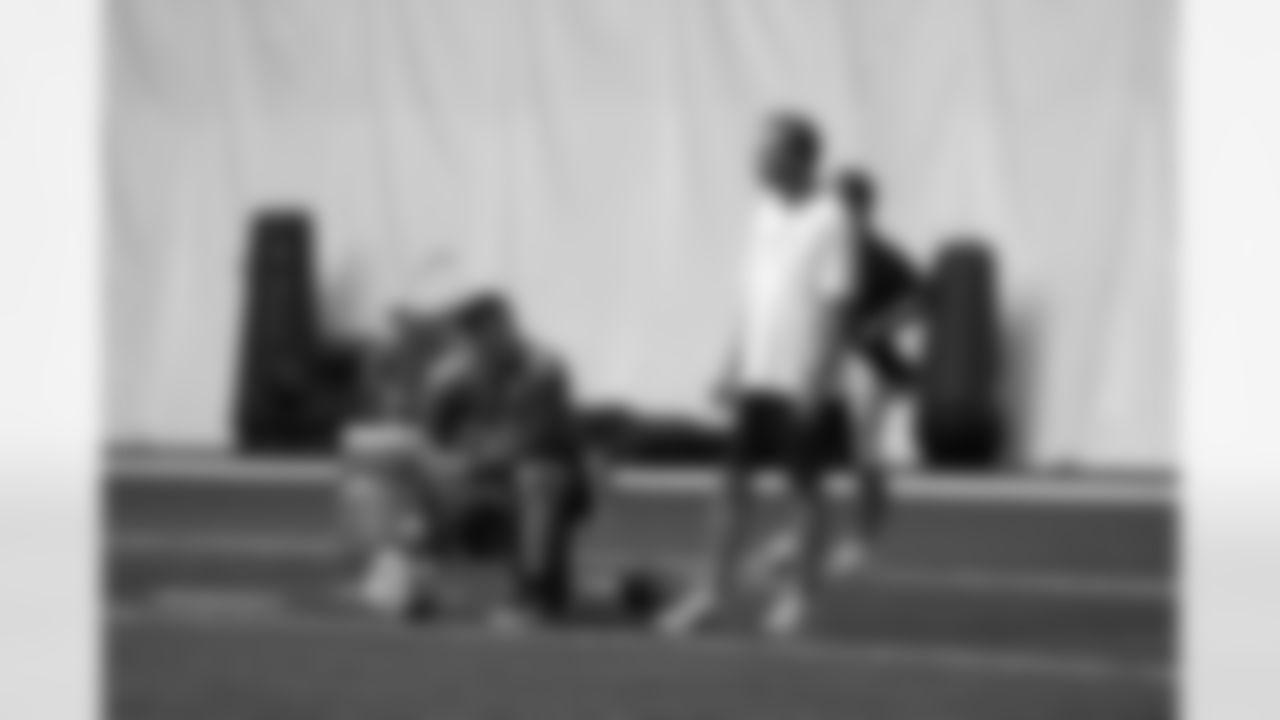 Titans players practice inside during Tuesday's organized training activity (OTA) at Baptist Sports Park in Nashville, Tenn.
