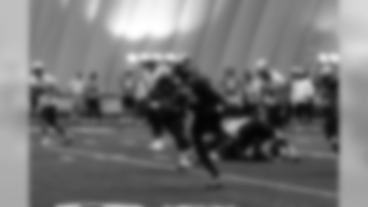 Titans players practice inside during Tuesday's organized training activity (OTA) at Baptist Sports Park in Nashville, Tenn.