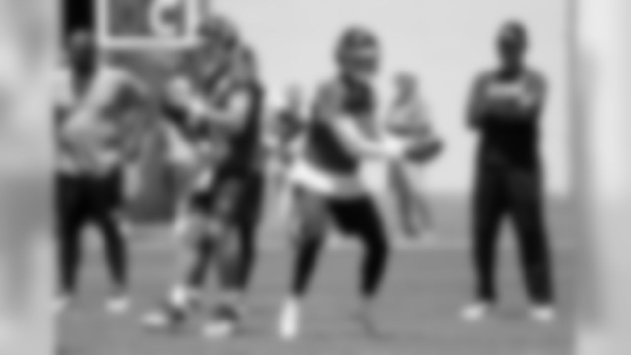 Tennessee Titans quarterbacks Blaine Gabbert (7) and Marcus Mariota (8) run a drill during an organized team activity at the Titans' NFL football training facility Tuesday, June 5, 2018, in Nashville, Tenn. (AP Photo/Mark Humphrey)