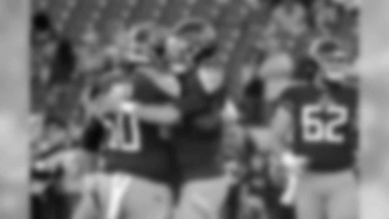 Tennessee Titans quarterback Marcus Mariota (8) hugs center Ben Jones (60) before an NFL football game against the New York Jets Sunday, Dec. 2, 2018, in Nashville, Tenn. (AP Photo/James Kenney)