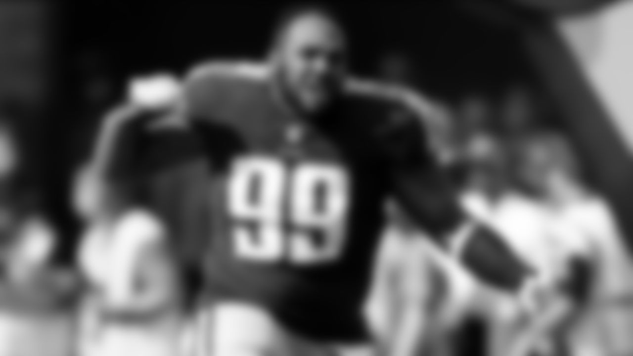 Tennessee Titans defensive end Jurrell Casey (99) leaps in the air and pumps his fists as he comes onto the field during pregame player introductions before the 2017 NFL week 9 regular season football game against the Baltimore Ravens, Sunday, Nov. 5, 2017 in Nashville, Tenn. The Titans won the game 23-20. (Paul Spinelli via AP)