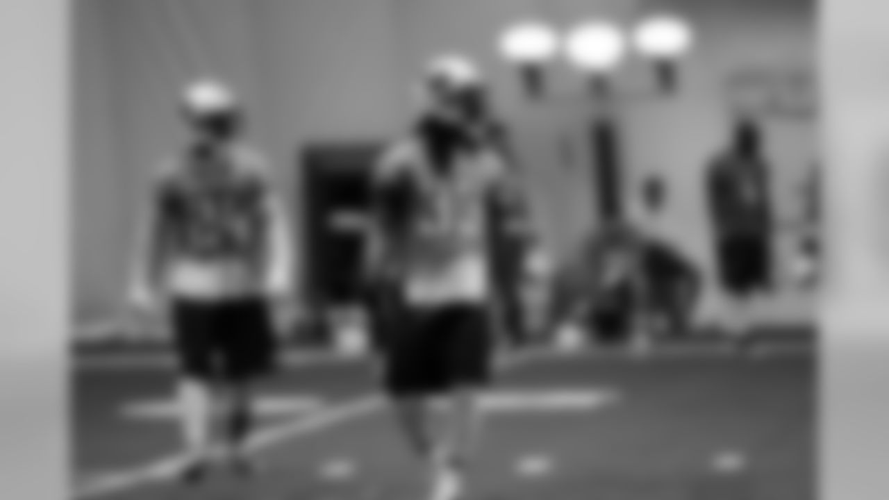 Titans players practice inside during Tuesday's organized training activity (OTA) at Baptist Sports Park in Nashville, Tenn.