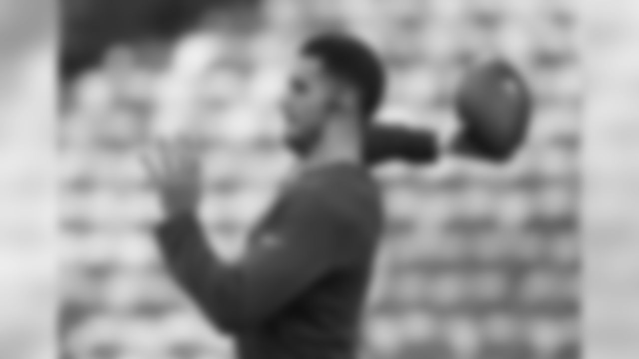 Tennessee Titans quarterback Marcus Mariota warms-up before an NFL football game against Los Angeles Chargers at Wembley stadium in London, Sunday, Oct. 21, 2018. (AP Photo/Tim Ireland)