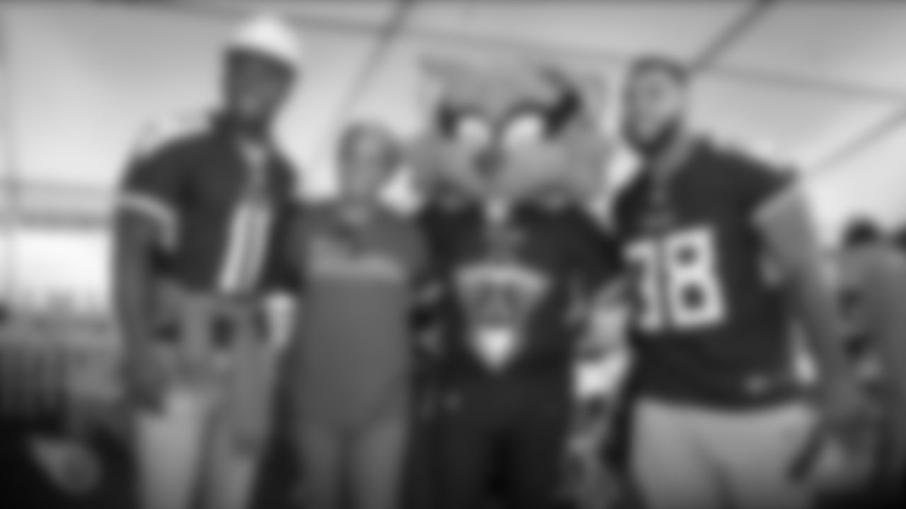 NASHVILLE, TN - OCTOBER 08, 2019 - Wide receiver A.J. Brown #11 of the Tennessee Titans and Defensive lineman Jeffery Simmons #98 of the Tennessee Titans with volunteers at a Jimmy & Rosalynn Carter Work Project and Habitat for Humanity build site in Nashville, TN. Photo By Donald Page/Tennessee Titans