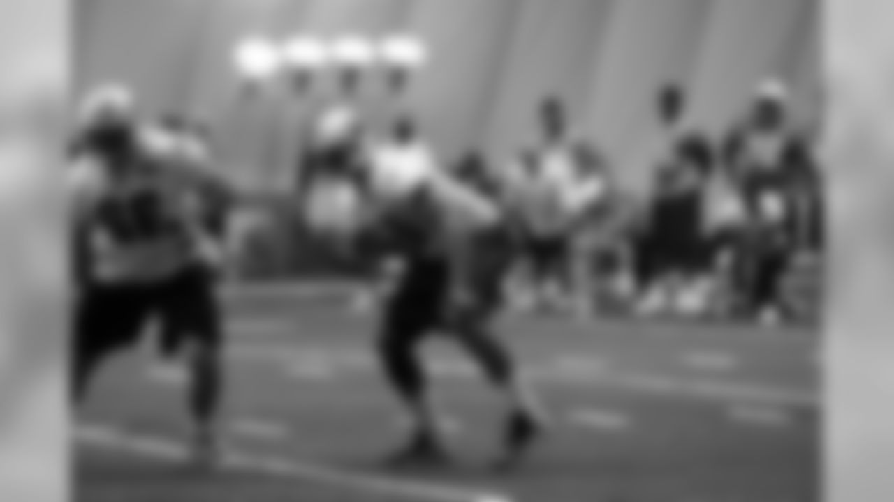 Titans players practice inside during Tuesday's organized training activity (OTA) at Baptist Sports Park in Nashville, Tenn.