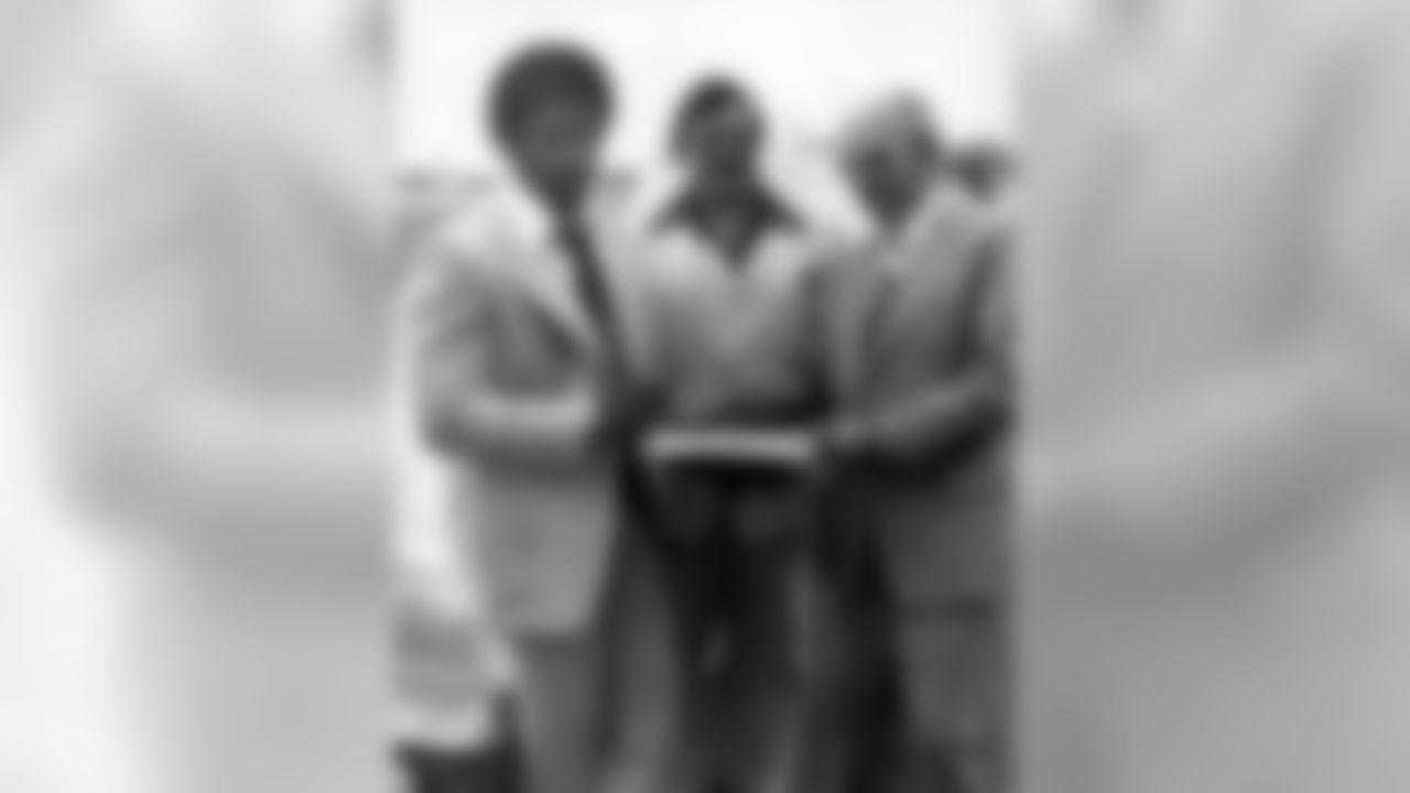 Earl Campbell arrives after Mr. Adams traded for the first pick in the 1978 NFL Draft to select the Heisman Trophy winner.