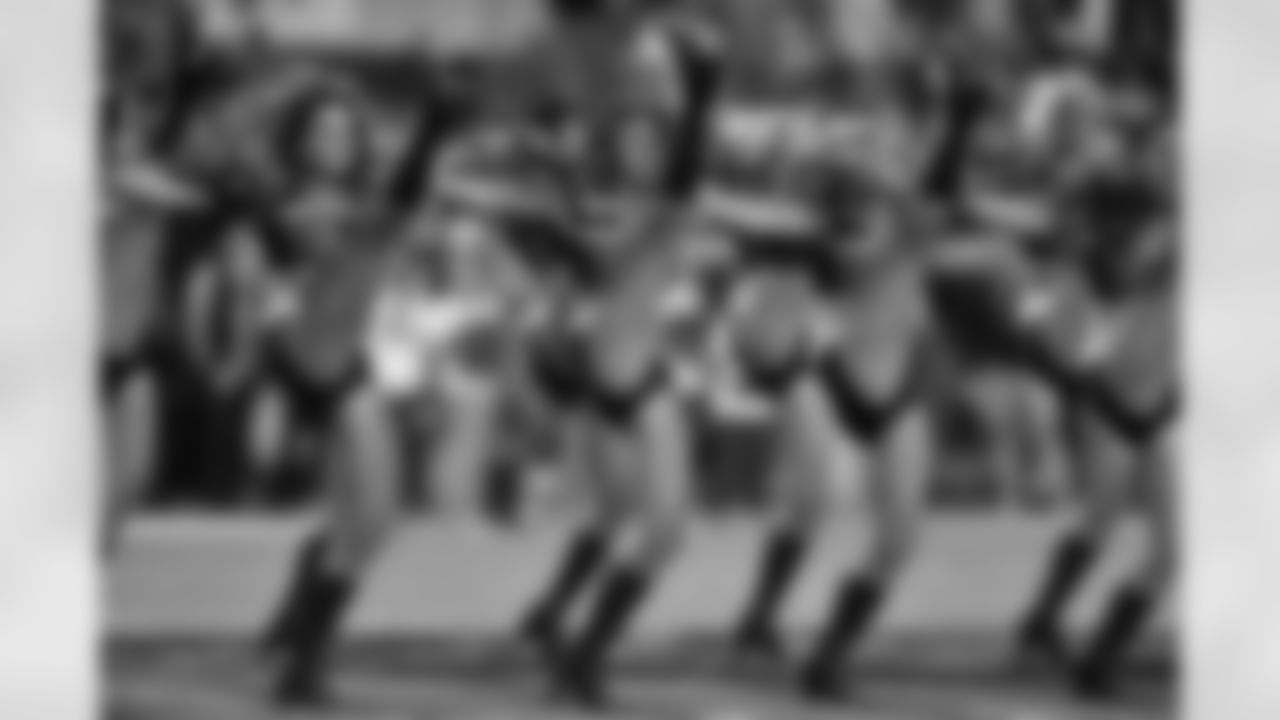 Members of the Jacksonville Jaguars Roar Cheerleaders perform in the first quarter during an NFL football game Monday, Oct. 18, 2010, in Jacksonville, Fla. (AP Photo/Stephen Morton)