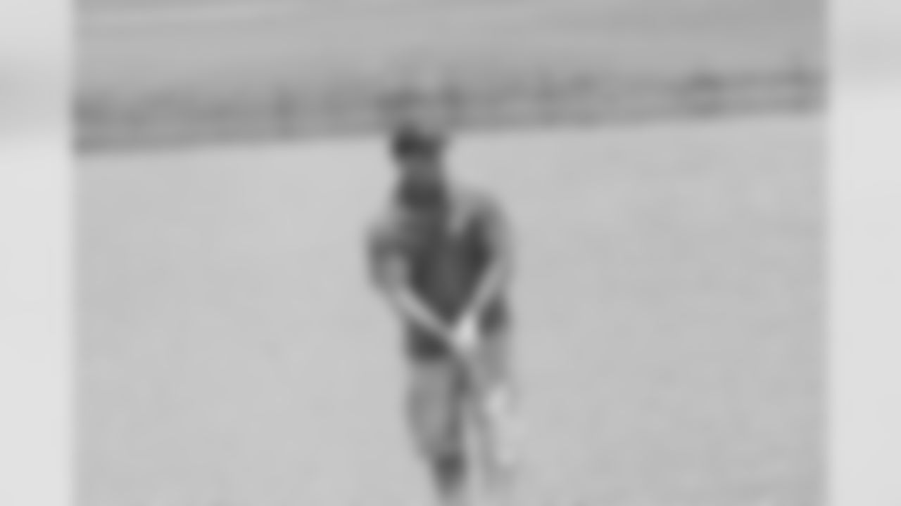 Christian music artist Gary Chapman chips up to the 7th hole