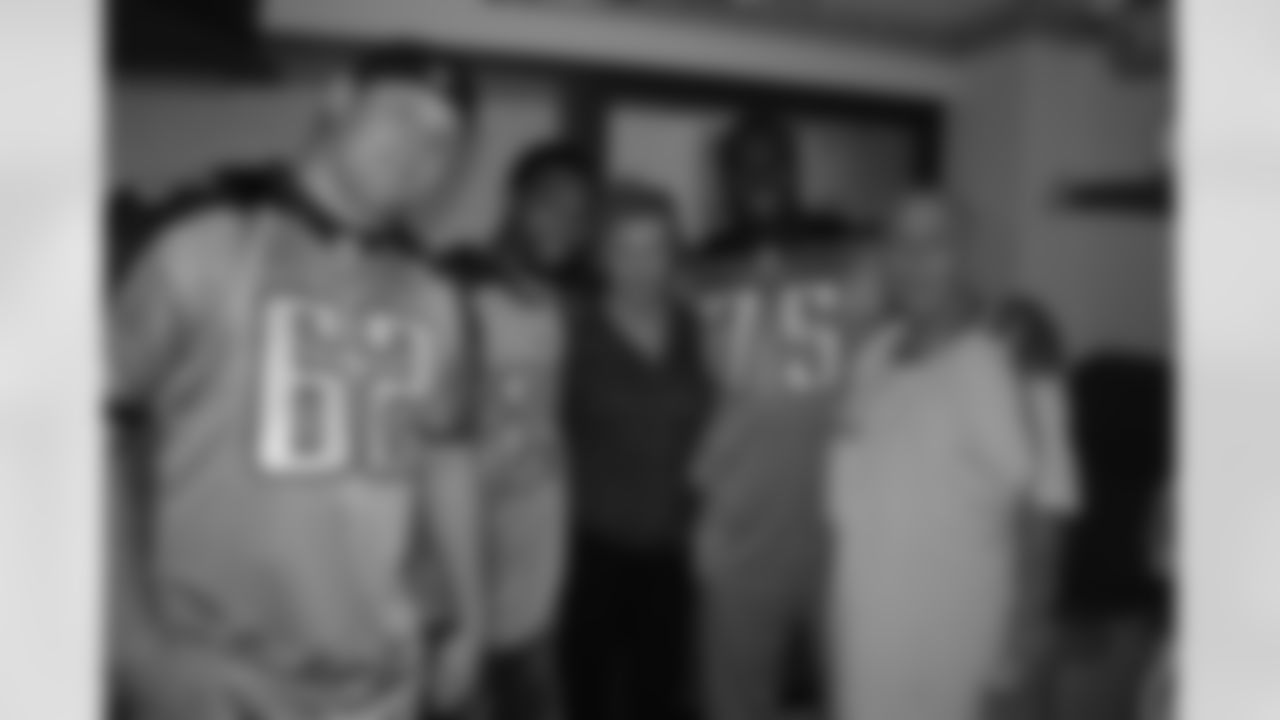 Titans players Jovan Haye (75), Kevin Vickerson (96), Sen'Derrick Marks (94), Mitch King (62) and Ryan Mouton (29) visit patients at Saint Thomas Hospital on Tuesday, Dec. 8, 2009 in Nashville, Tenn.