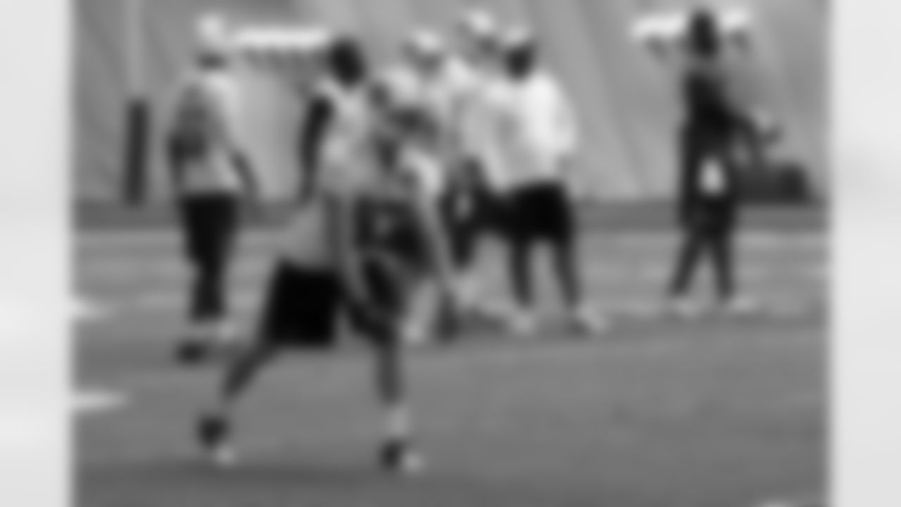 Titans players practice inside during Tuesday's organized training activity (OTA) at Baptist Sports Park in Nashville, Tenn.