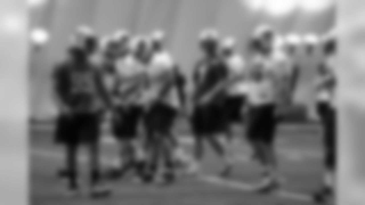 Titans players practice inside during Tuesday's organized training activity (OTA) at Baptist Sports Park in Nashville, Tenn.