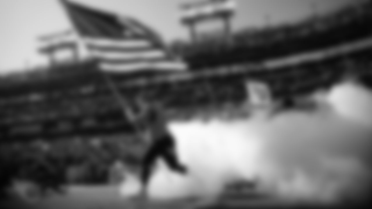 NASHVILLE, TN - NOVEMBER 10, 2019 - Center Ben Jones #60 of the Tennessee Titans carries out large American flag during the introductions before the game between the Tennessee Titans and the Kansas City Chiefs at Nissan Stadium in Nashville, TN. Photo By Donald Page/Tennessee Titans