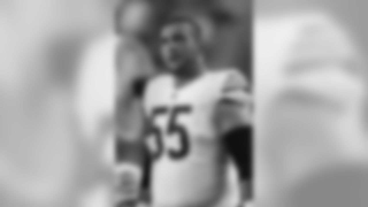 Chicago Bears center Hroniss Grasu (55) stands on the sidelines in the second half of a NFL preseason football game against the Cincinnati Bengals, Saturday, Aug. 29, 2015, in Cincinnati. (AP Photo/Gary Landers)