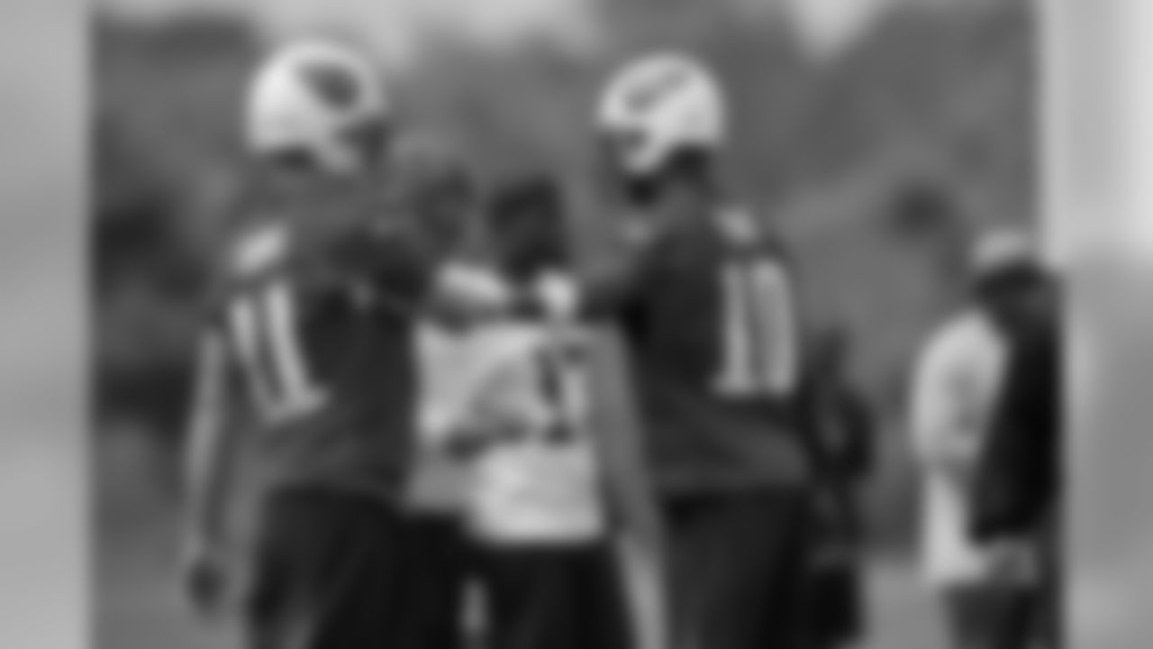Titans veteran and rookie players practice during Tuesday's organized training session at Baptist Sports Park in Nashville, Tenn.
