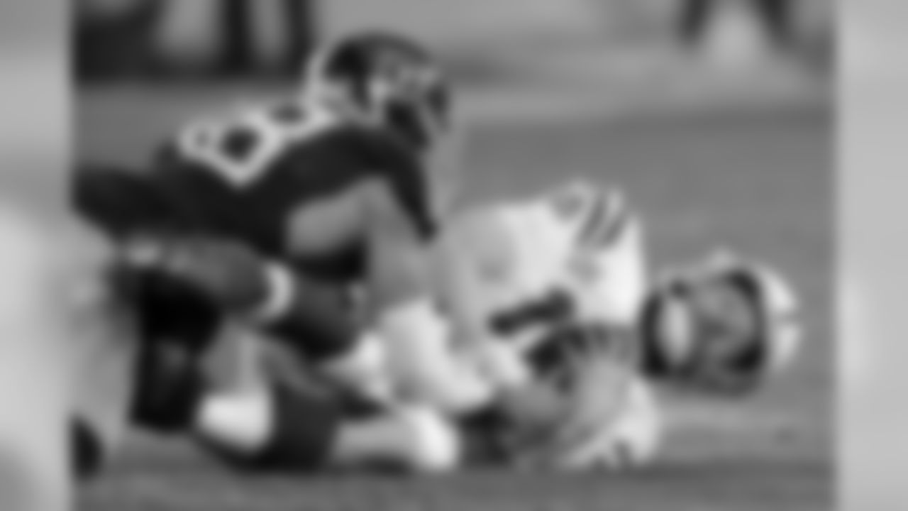 Indianapolis Colts quarterback Andrew Luck (12) is brought down by Tennessee Titans linebacker Harold Landry (58) in the second half of an NFL football game Sunday, Dec. 30, 2018, in Nashville, Tenn. (AP Photo/James Kenney)