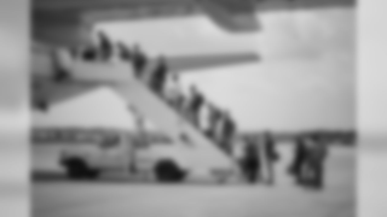 NASHVILLE, TN - AUGUST 07, 2019 - A group of players board the plane during the travel day before preseason in Nashville, TN. Photo By Donald Page/Tennessee Titans