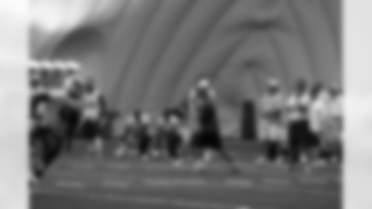 Titans players practice inside during Tuesday's organized training activity (OTA) at Baptist Sports Park in Nashville, Tenn.