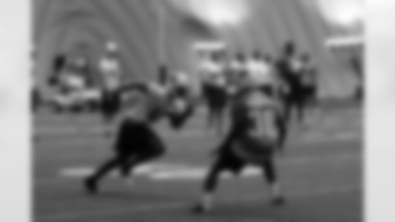 Titans players practice inside during Tuesday's organized training activity (OTA) at Baptist Sports Park in Nashville, Tenn.
