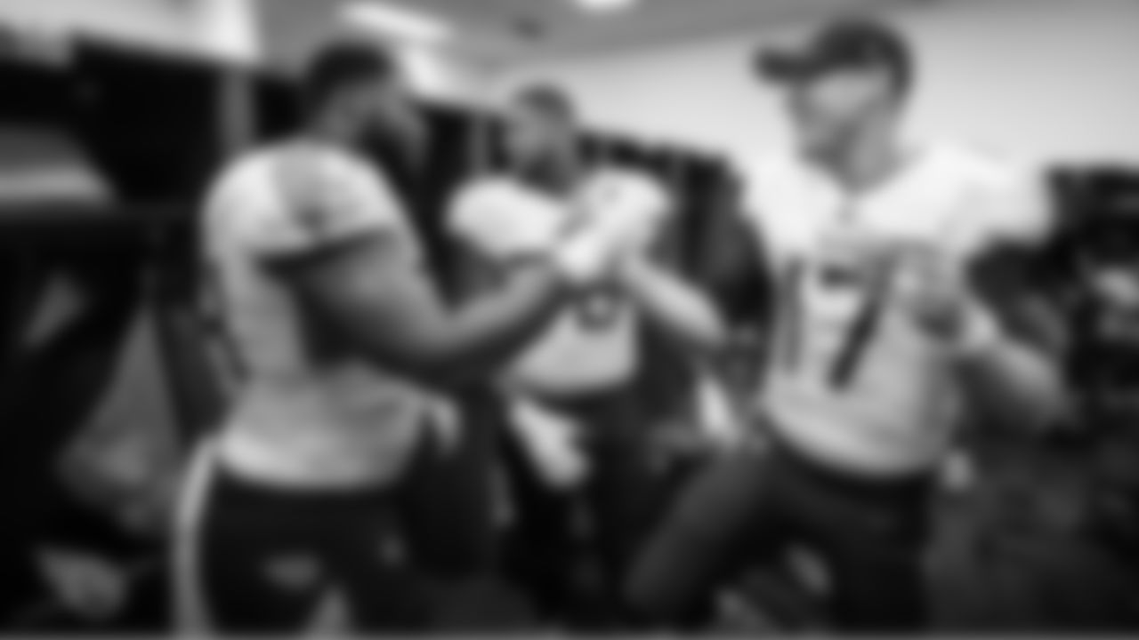 BALTIMORE, MD - JANUARY 11, 2020 - Offensive lineman Nate Davis #64 and Quarterback Ryan Tannehill #17 of the Tennessee Titans celebrate in the locker room after the AFC Divisional Playoff Game between the Tennessee Titans and the Baltimore Ravens at M&T Bank Stadium in Baltimore, MD. Photo By Donald Page/Tennessee Titans