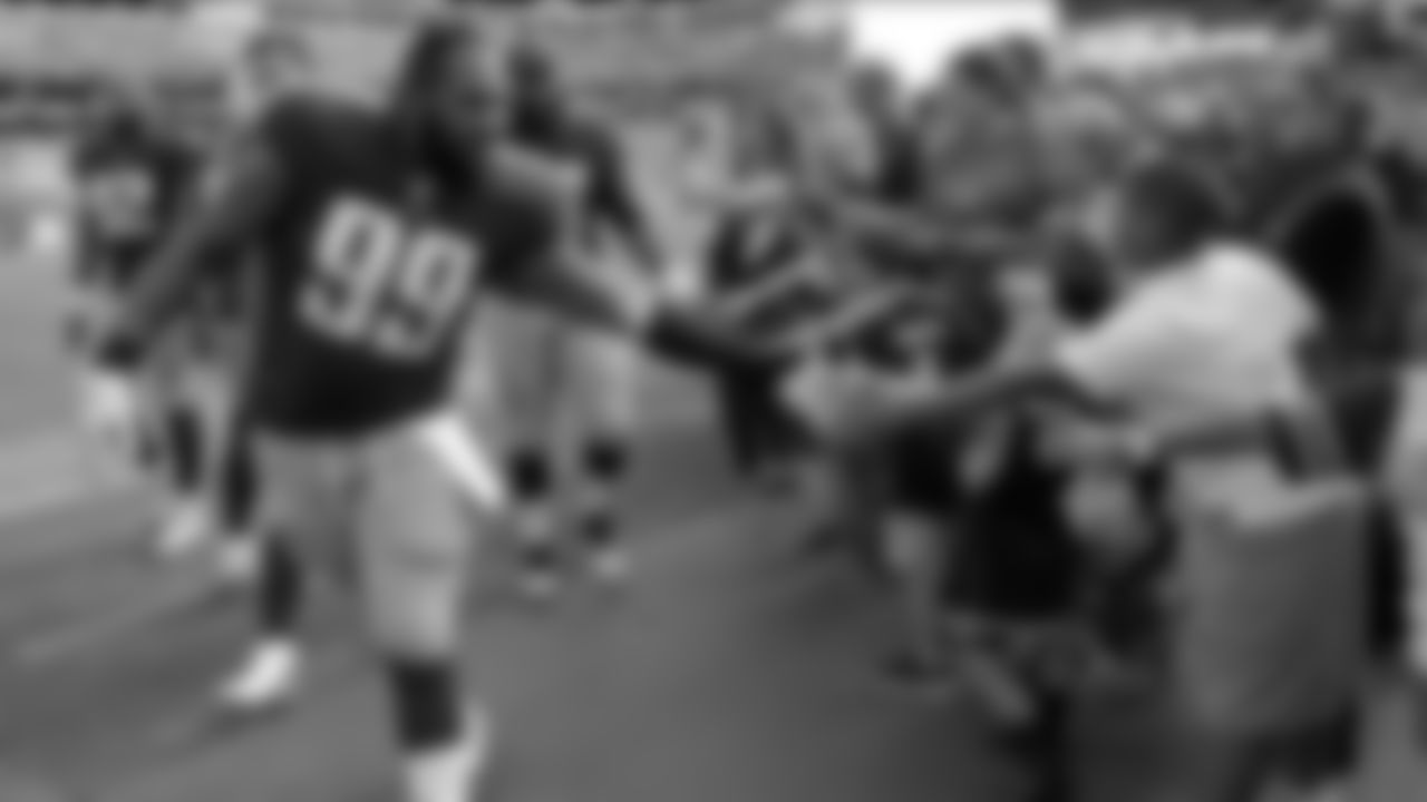 Tennessee Titans defensive end Jurrell Casey (99) greets fans before an NFL football game against the Baltimore Ravens Sunday, Nov. 5, 2017, in Nashville, Tenn. (AP Photo/James Kenney)
