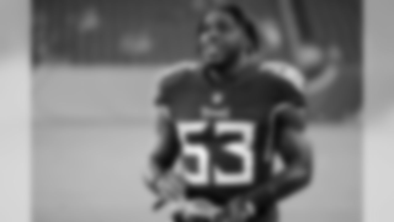 Tennessee Titans linebacker Daren Bates warms up before a preseason NFL football game against the Minnesota Vikings Thursday, Aug. 30, 2018, in Nashville, Tenn. (AP Photo/James Kenney)