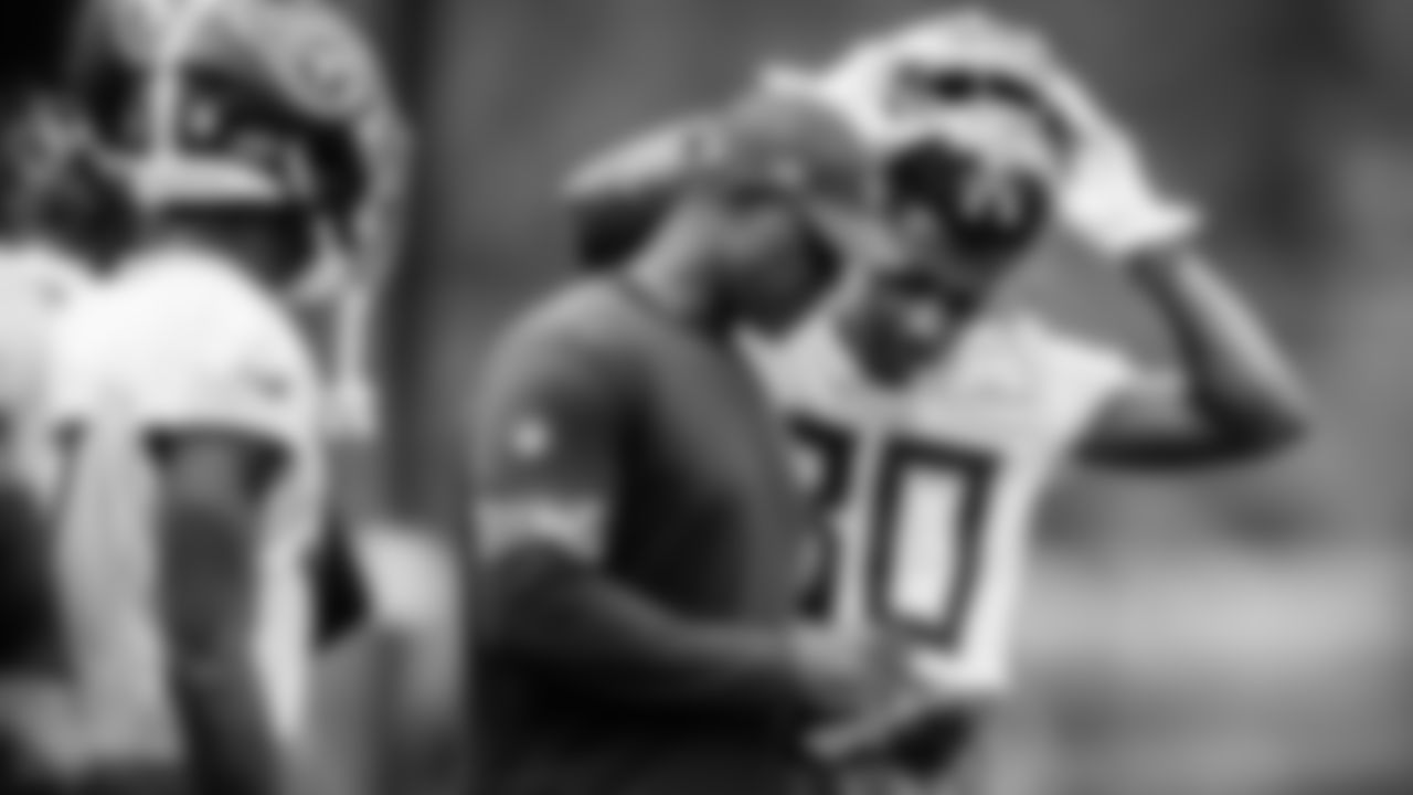 Wide Receivers Coach Rob Moore of the Tennessee Titans and Wide receiver Juwan Green #80 of the Tennessee Titans during training camp at Ascension Saint Thomas Sports Park on July 27, 2022 in Nashville, TN. Photo By Donald Page/Tennessee Titans