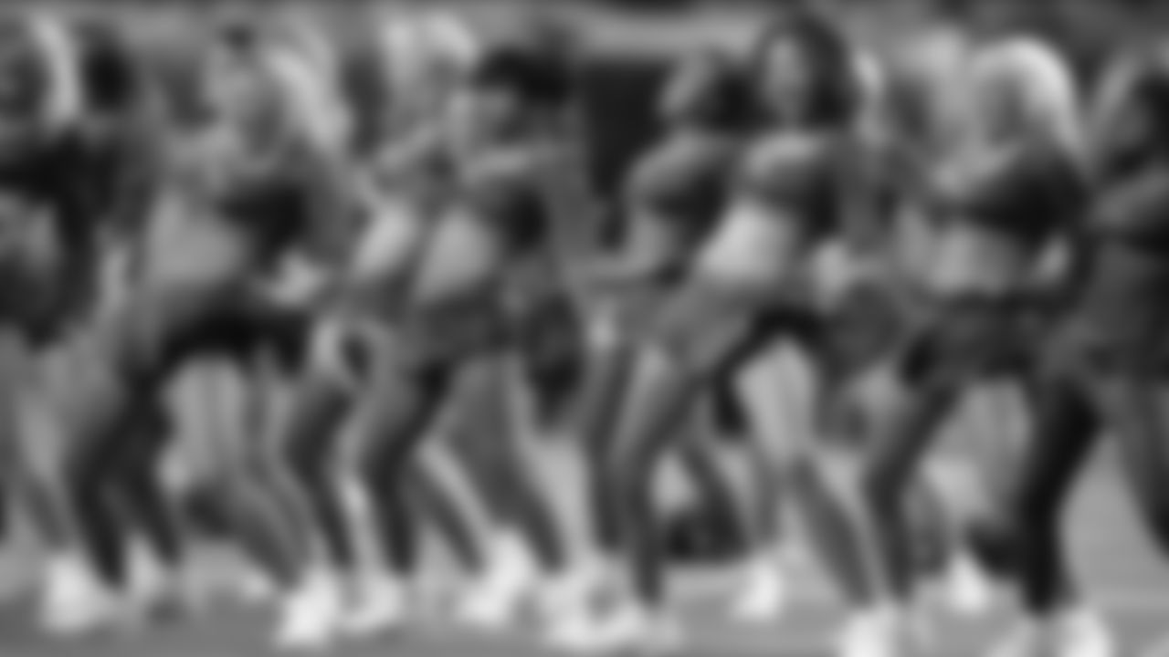 The Tennessee Titans cheerleaders perform before Super Bowl XXXIV, a 23-16 Titans loss to the St. Louis Rams on January 30, 2000, at the Georgia Dome in Atlanta, Georgia. (AP Photo / Al Messerschmidt)