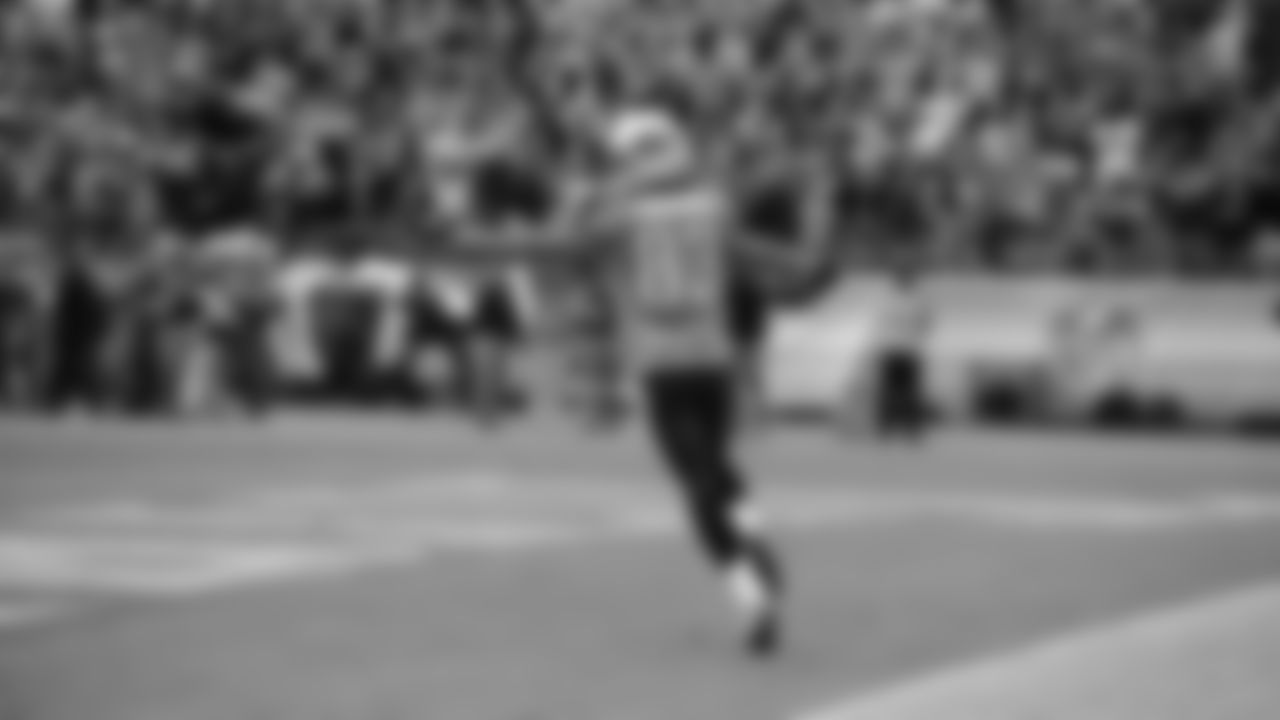 Tennessee Titans wide receiver Marc Mariani runs in the end zone after returning a kickoff for a touchdown against the Denver Broncos in the third quarter of an NFL football game on Sunday, Oct. 3, 2010, in Nashville, Tenn. (AP Photo/Joe Howell)