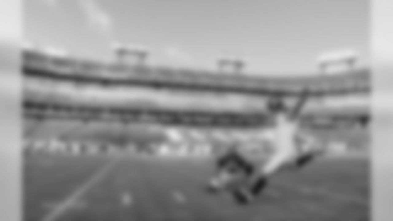 Tampa Bay Buccaneers kicker Chandler Catanzaro warms up as Bryan Anger (9) holds before a preseason NFL football game against the Tennessee Titans Saturday, Aug. 18, 2018, in Nashville, Tenn. (AP Photo/Mark Zaleski)