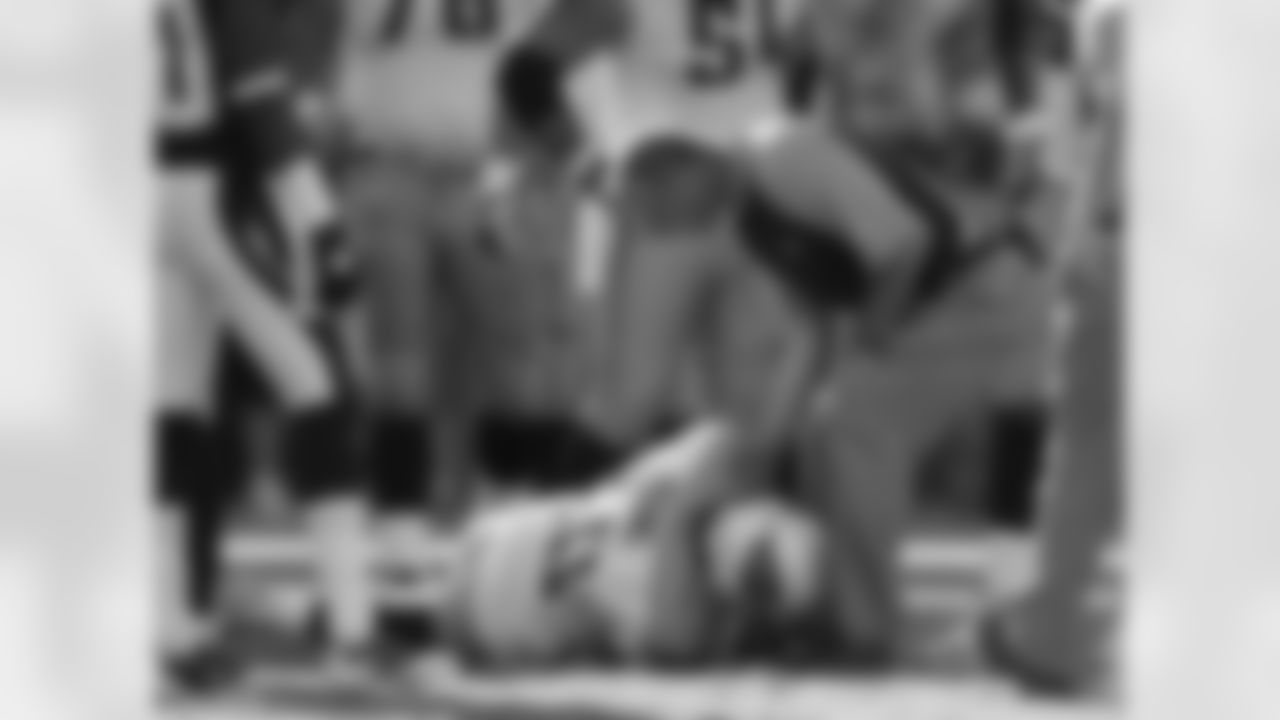 Tennessee Titans quarterback Vince Young (10) lies on the fields after being injured on a play against the San Diego Chargers in the second half in an NFL football game Sunday, Oct. 31, 2010, in San Diego. (AP Photo/Gregory Bull)