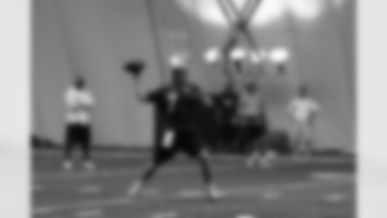 Titans players practice inside during Tuesday's organized training activity (OTA) at Baptist Sports Park in Nashville, Tenn.