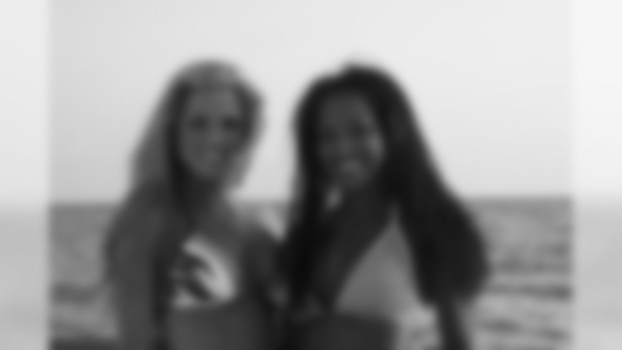 Tennessee Titans cheerleaders take part in a sunset photo shoot Tuesday afternoon at the Sandestin Golf and Beach Resort.