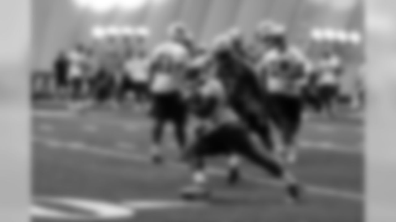 Titans players practice inside during Tuesday's organized training activity (OTA) at Baptist Sports Park in Nashville, Tenn.