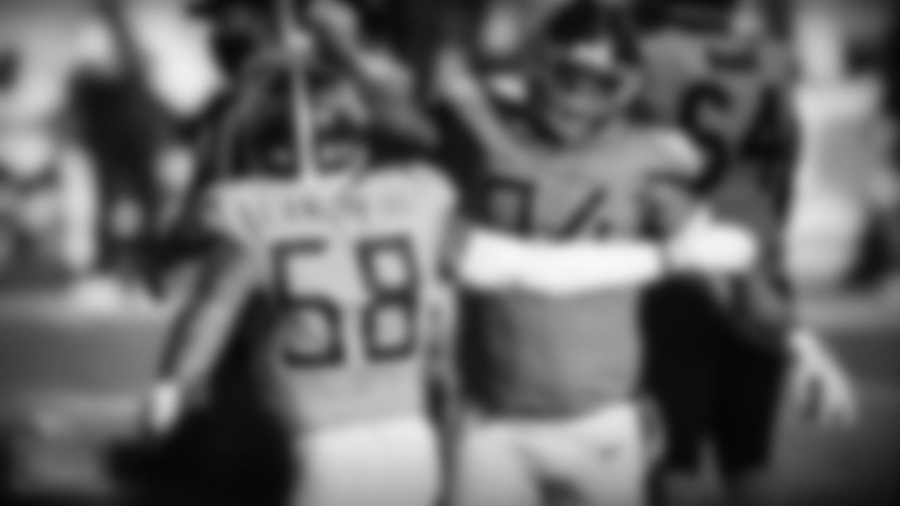 Outside linebacker Harold Landry III #58 of the Tennessee Titans and Jack Crawford #94 during the game between the Tennessee Titans and the Chicago Bears at Nissan Stadium on NOVEMBER 08, 2020 in Nashville, TN. Photo By Kate Luffman/Tennessee Titans