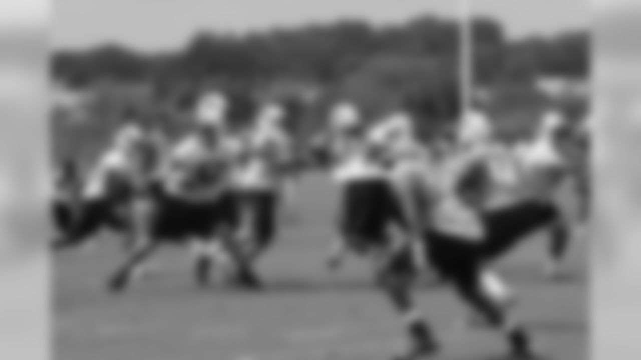 Titans players practice outside during Thursday's organized training activity (OTA) at Baptist Sports Park in Nashville, Tenn.