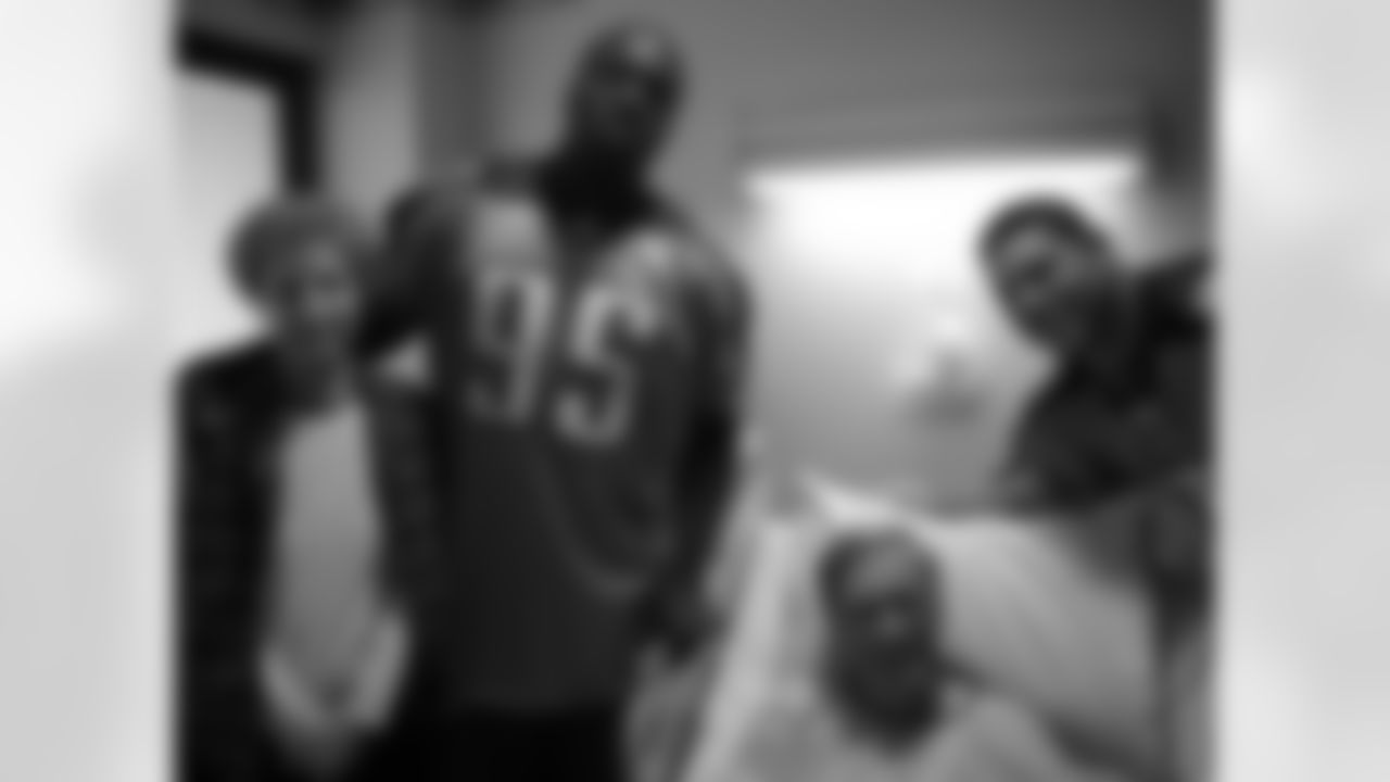 Titans players Craig Stevens (88), Jason Jones (91), William Hayes (95) and Ken Amato (58) visit patients at Saint Thomas Hospital on Tuesday, Nov. 3, 2009 in Nashville, Tenn.