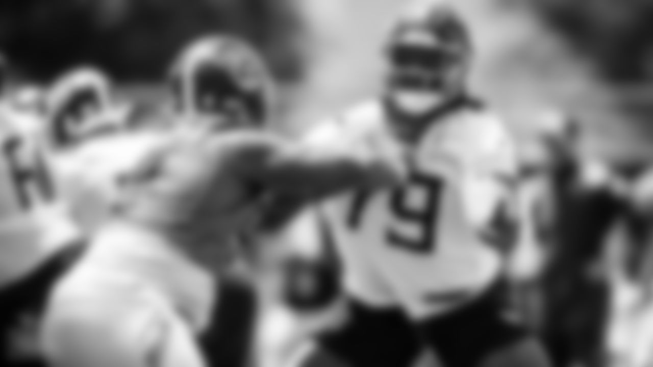 Defensive tackle Jayden Peevy #92 of the Tennessee Titans and Offensive lineman Jaelyn Duncan #79 of the Tennessee Titans during offseason minicamp practice at Ascension Saint Thomas Sports Park on June 06, 2023 in Nashville, TN. Photo By Donald Page/Tennessee Titans