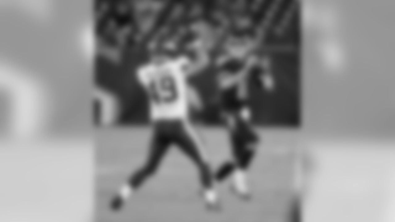 Tennessee Titans quarterback Luke Falk (11) is pressured by Minnesota Vikings linebacker Mike Needham (49) in the second half of a preseason NFL football game Thursday, Aug. 30, 2018, in Nashville, Tenn. The Vikings won 13-3. (AP Photo/James Kenney)