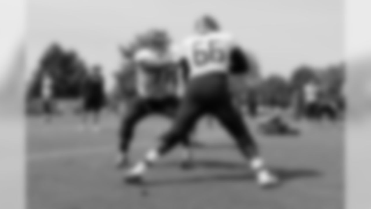 Tennessee Titans offensive guards Xavier Su'a-Filo (76) and Kevin Pamphile (66) run a drill during NFL football training camp Monday, July 30, 2018, in Nashville, Tenn. (AP Photo/Mark Humphrey)