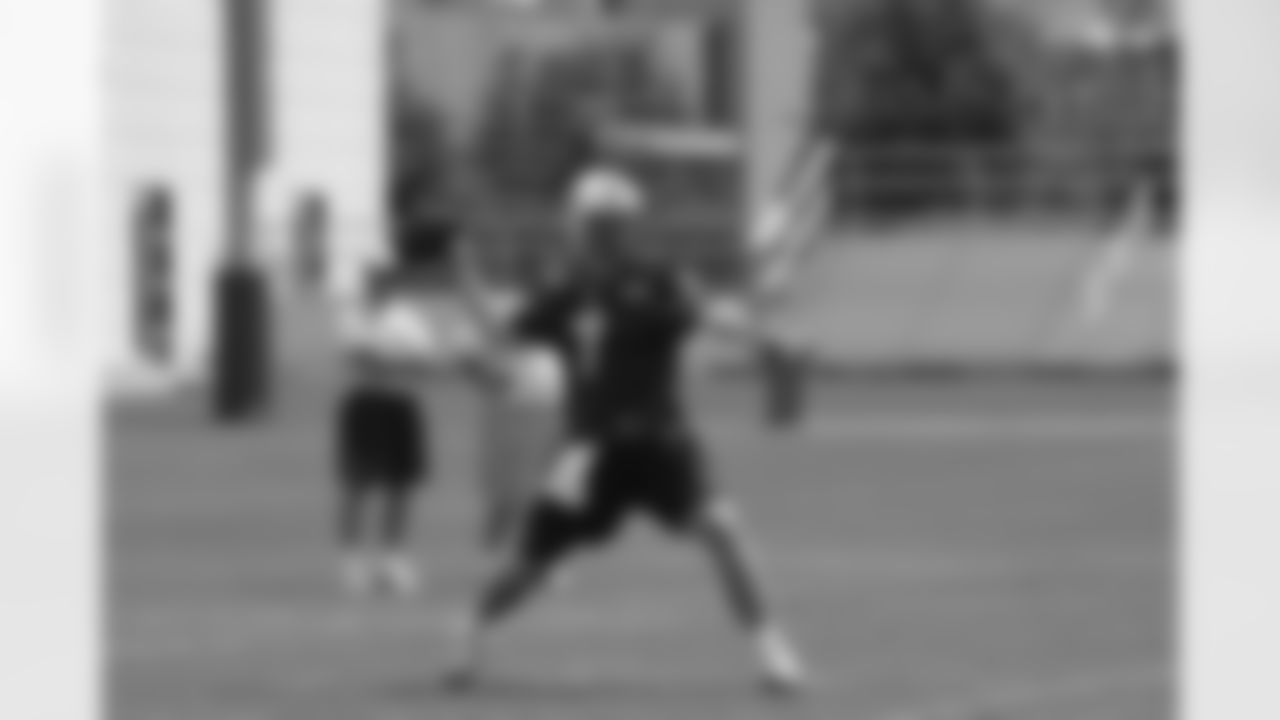 Titans players practice outside during Thursday's organized training activity (OTA) at Baptist Sports Park in Nashville, Tenn.