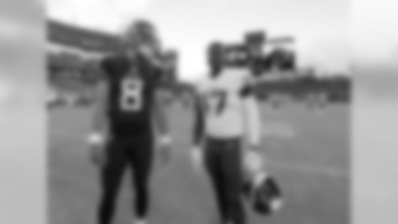 Tennessee Titans quarterback Marcus Mariota (8) talks with Minnesota Vikings wide receiver and former Titan Kendall Wright (17) before a preseason NFL football game Thursday, Aug. 30, 2018, in Nashville, Tenn. (AP Photo/Mark Zaleski)