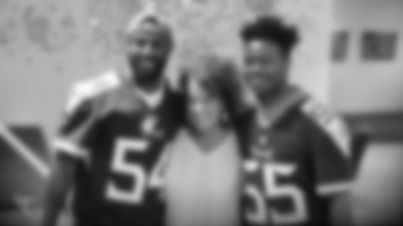 NASHVILLE, TN - JULY 23, 2019 - Linebacker Rashaan Evans #54 of Tennessee Titans and Linebacker Jayon Brown #55 of Tennessee Titans delivering season tickets to season ticket holders in Nashville, TN. Photo By Donald Page/Tennessee Titans