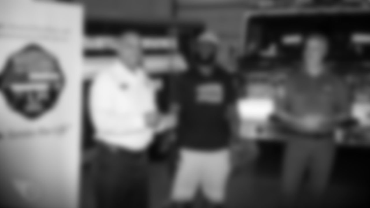 NASHVILLE, TN - OCTOBER 01, 2019 - Rashaan Evans surprises three Nashville fire fighters with tickets and a shopping spree with partner Academy Sports and Outdoors in Nashville, TN. Photo By Donald Page/Tennessee Titans