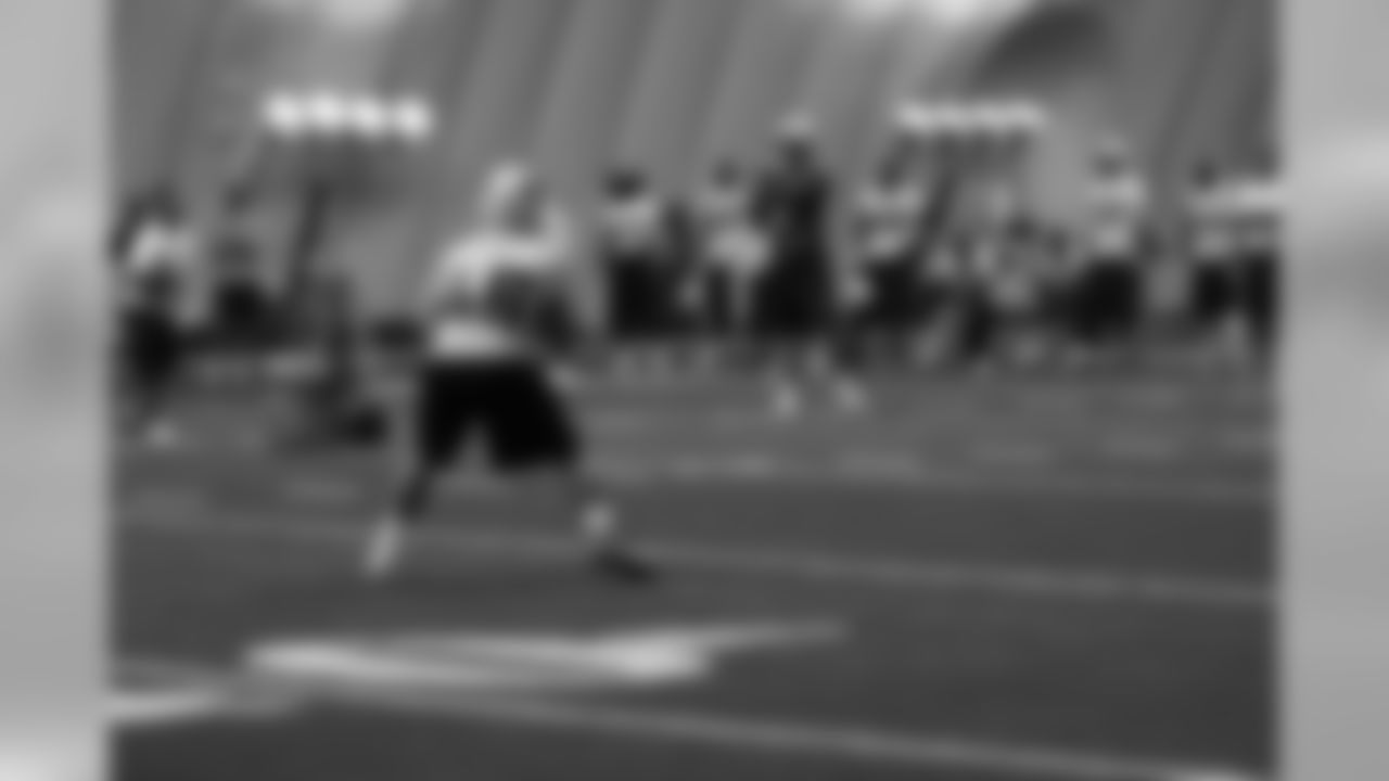 Titans players practice inside during Tuesday's organized training activity (OTA) at Baptist Sports Park in Nashville, Tenn.