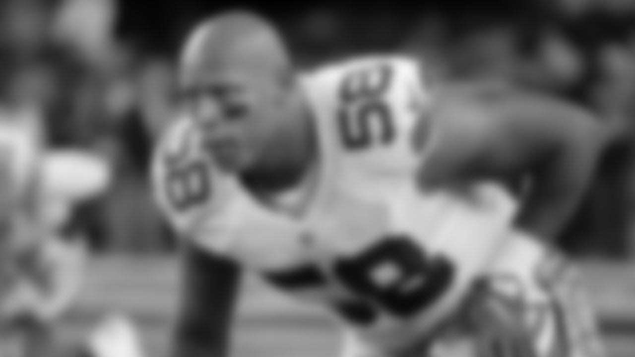 Dallas Cowboys' Jack Crawford (58) stretches on the field before an NFL football game against the Philadelphia Eagles on Sunday, Nov. 8, 2015, in Arlington, Texas. (AP Photo/Brandon Wade)